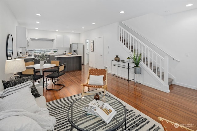 living room with light hardwood / wood-style flooring