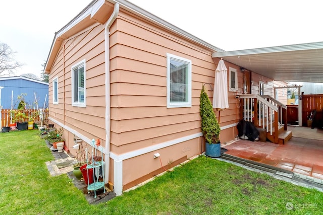 view of property exterior featuring a yard