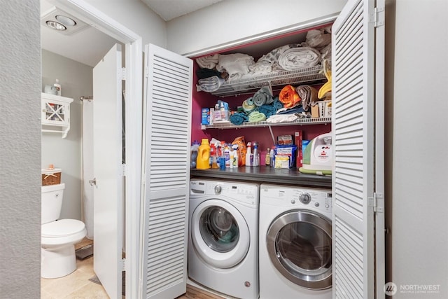 laundry area featuring independent washer and dryer and laundry area