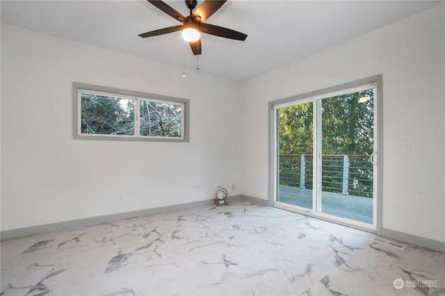 spare room featuring ceiling fan