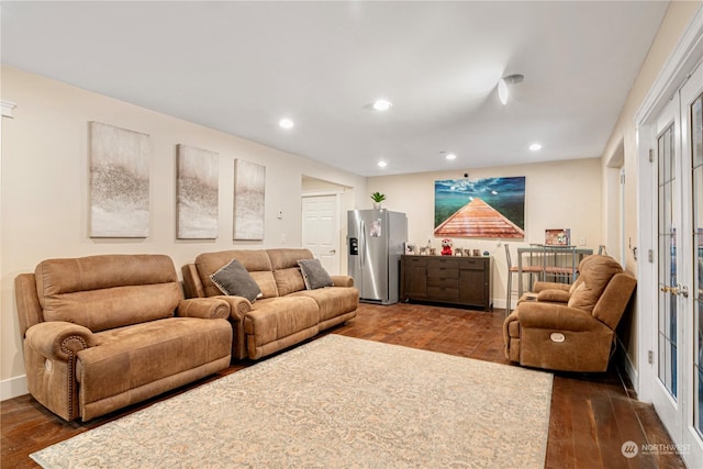 living room featuring dark hardwood / wood-style flooring