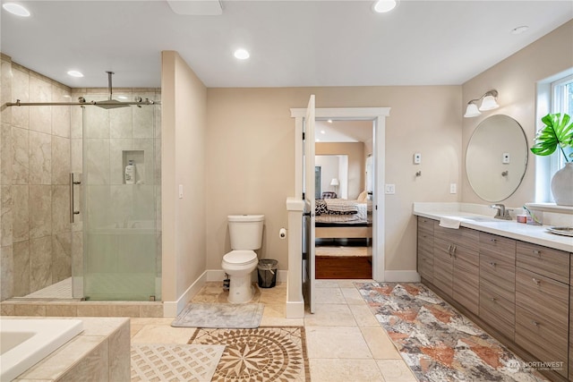 full bathroom with toilet, tile patterned floors, vanity, and shower with separate bathtub