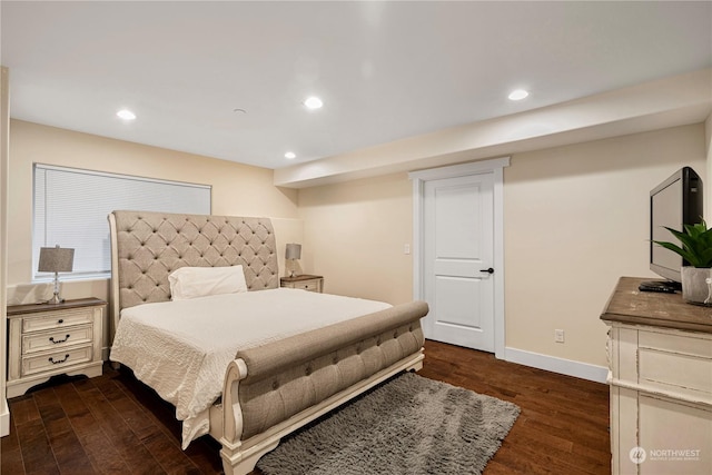 bedroom featuring dark hardwood / wood-style floors