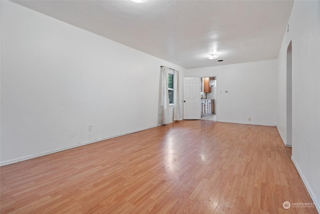 empty room featuring light hardwood / wood-style floors