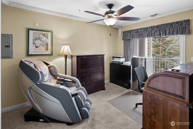 carpeted office space with crown molding, electric panel, and ceiling fan