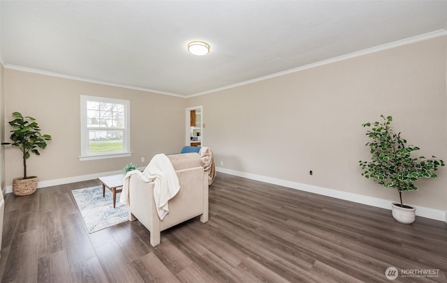 living room with dark wood-style floors, baseboards, and ornamental molding