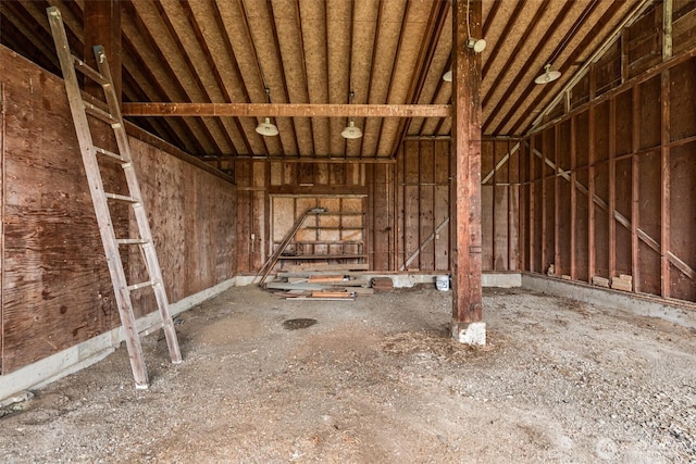 miscellaneous room featuring lofted ceiling