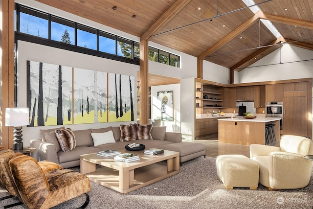 living room with beamed ceiling, high vaulted ceiling, and wood ceiling