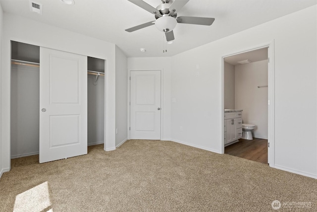 204 Cherry St, Mattawa, WA 99349 - unfurnished bedroom featuring carpet flooring, a closet, connected bathroom, and a ceiling fan