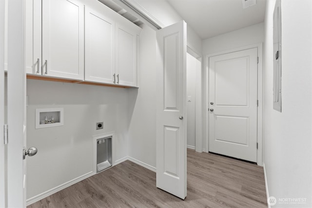 204 Cherry St, Mattawa, WA 99349 - laundry room featuring cabinet space, light wood-style flooring, washer hookup, and electric dryer hookup