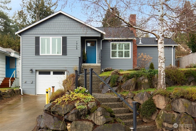 view of front of property featuring a garage