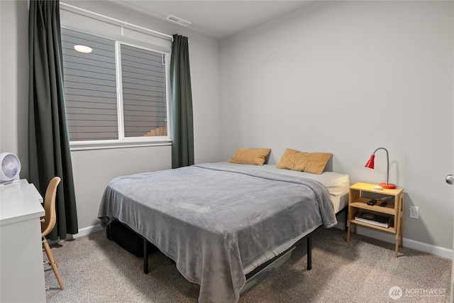 bedroom featuring carpet