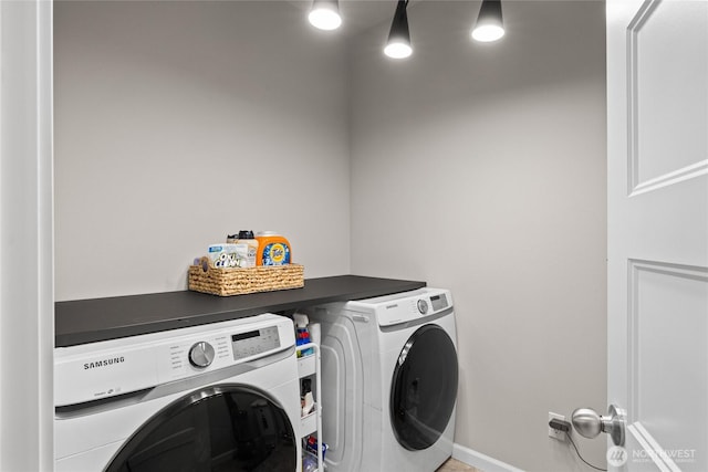 laundry area with washer and dryer