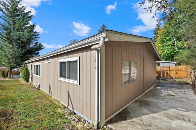 view of property exterior featuring a yard