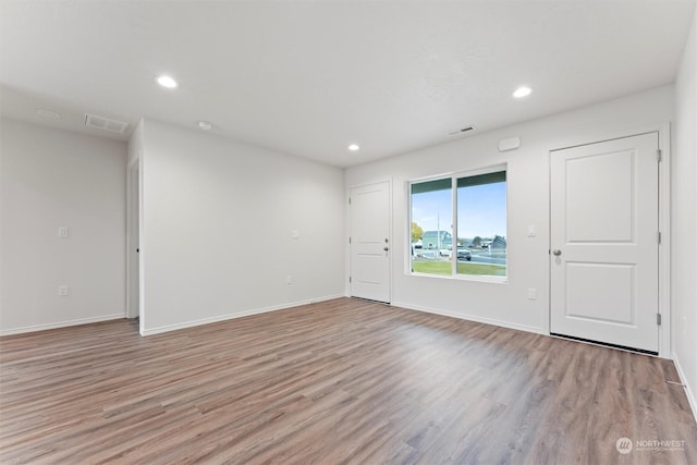 empty room featuring light hardwood / wood-style floors