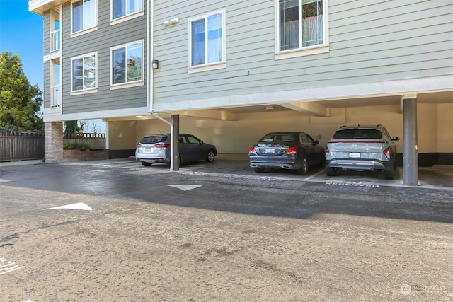 view of vehicle parking featuring a carport