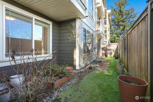 view of home's exterior with a lawn