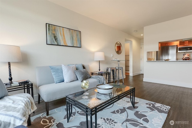 living room featuring dark hardwood / wood-style flooring