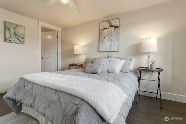 bedroom with dark wood-type flooring and ceiling fan