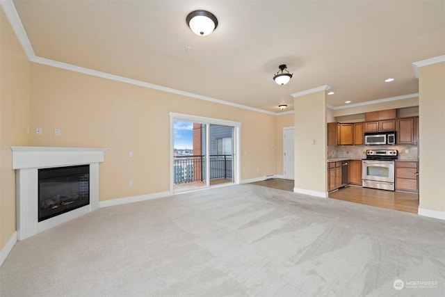 unfurnished living room featuring crown molding and light carpet