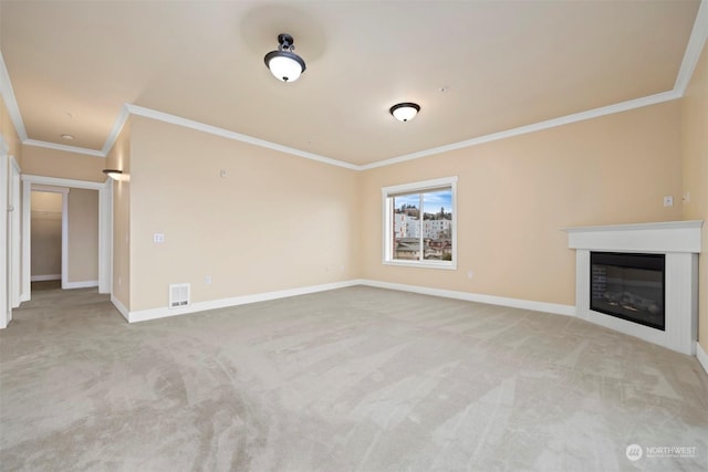 unfurnished living room with crown molding and light colored carpet