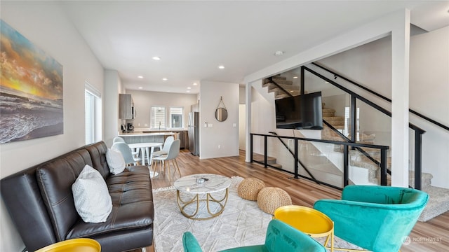 living room with light hardwood / wood-style floors