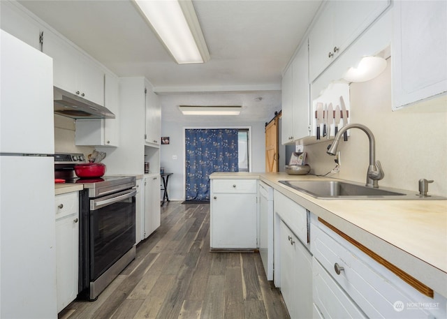 kitchen with white cabinetry, sink, and white appliances