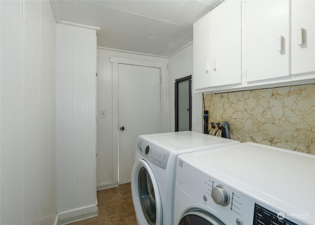 laundry area featuring cabinets and washer and dryer