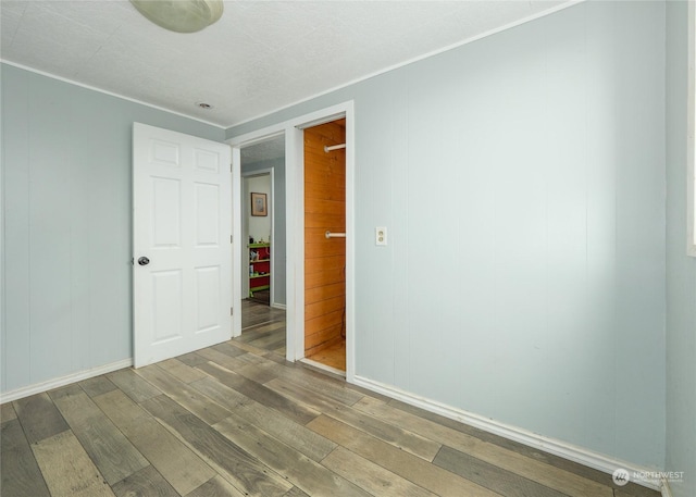 spare room featuring hardwood / wood-style flooring