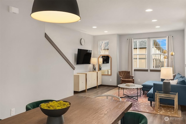 living room featuring dark wood-type flooring