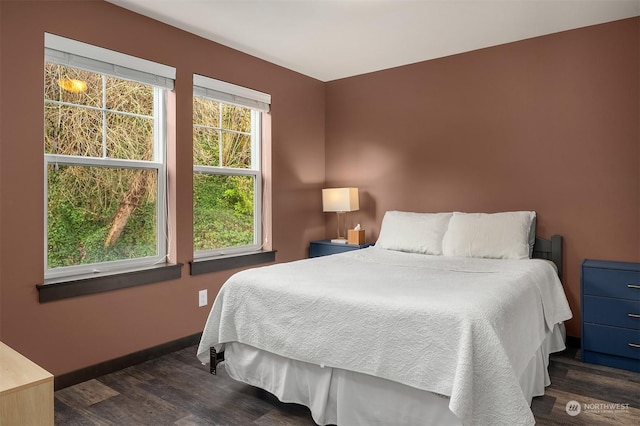 bedroom featuring dark hardwood / wood-style floors