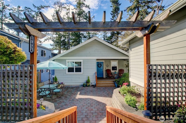 exterior space featuring a pergola and a patio