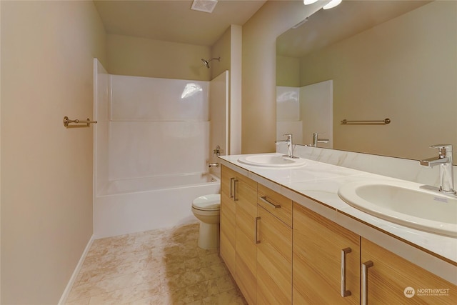 full bathroom with vanity, shower / bathtub combination, and toilet