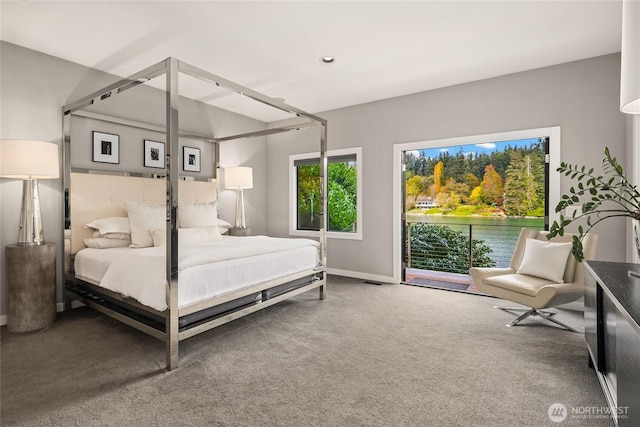 bedroom featuring baseboards and carpet flooring