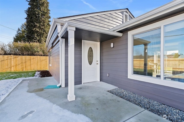 doorway to property featuring a patio