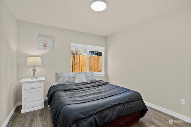 bedroom featuring dark hardwood / wood-style floors