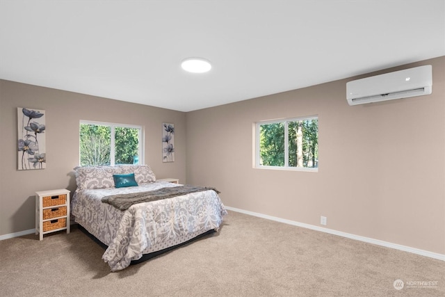 carpeted bedroom with multiple windows and a wall unit AC