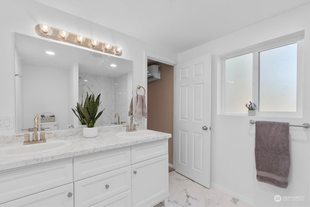 bathroom with vanity, a shower, and an AC wall unit