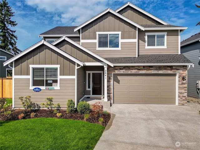 craftsman-style house featuring a garage