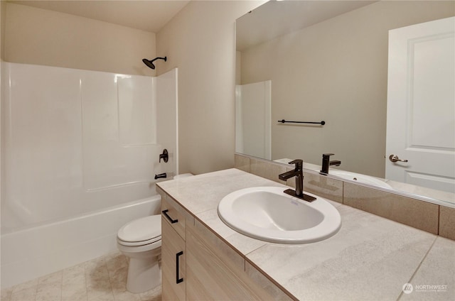 full bathroom featuring vanity, tile patterned floors,  shower combination, and toilet