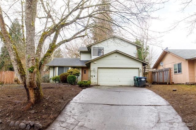 view of front of property with a garage