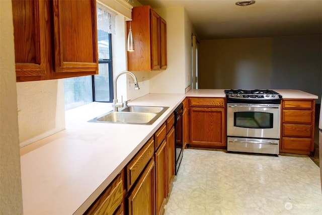 kitchen with stainless steel gas stove, sink, and black dishwasher