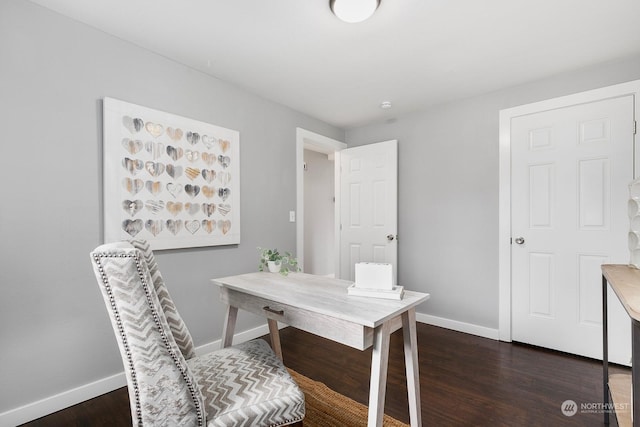 home office with dark wood-type flooring