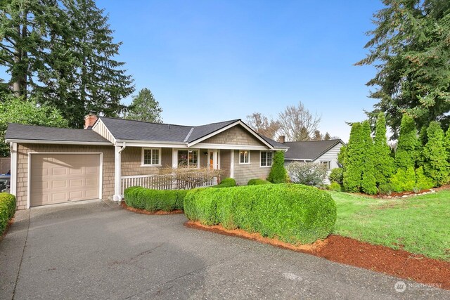 single story home with a garage