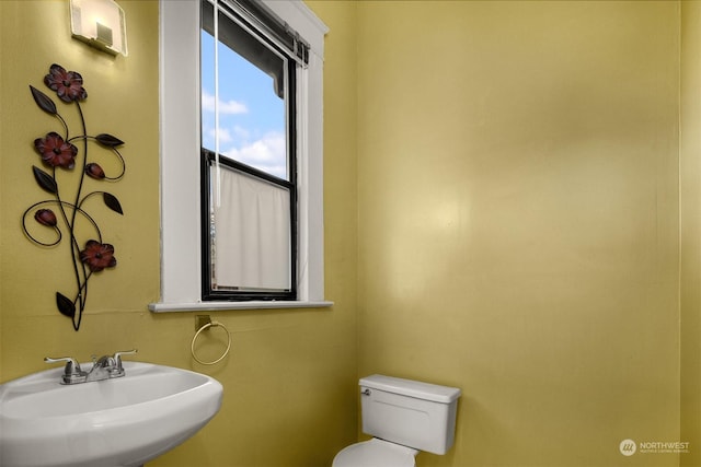 bathroom with sink and toilet