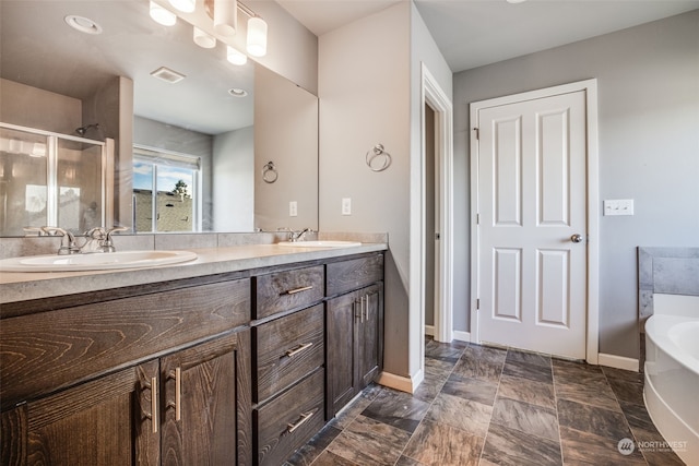 bathroom featuring vanity and plus walk in shower