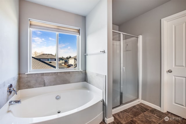 bathroom with independent shower and bath