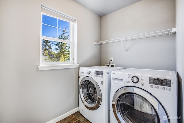 laundry room featuring washer and clothes dryer