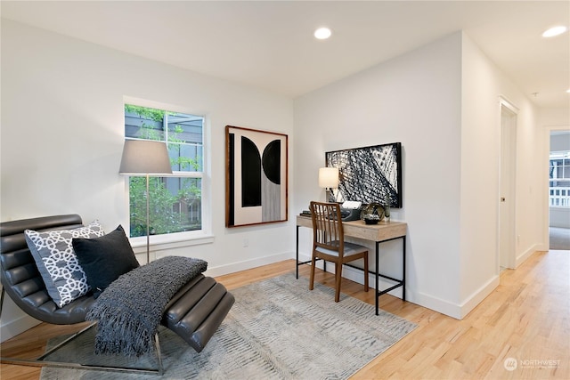 office area featuring baseboards, wood finished floors, and recessed lighting