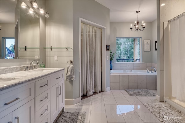 bathroom featuring vanity, a notable chandelier, and independent shower and bath